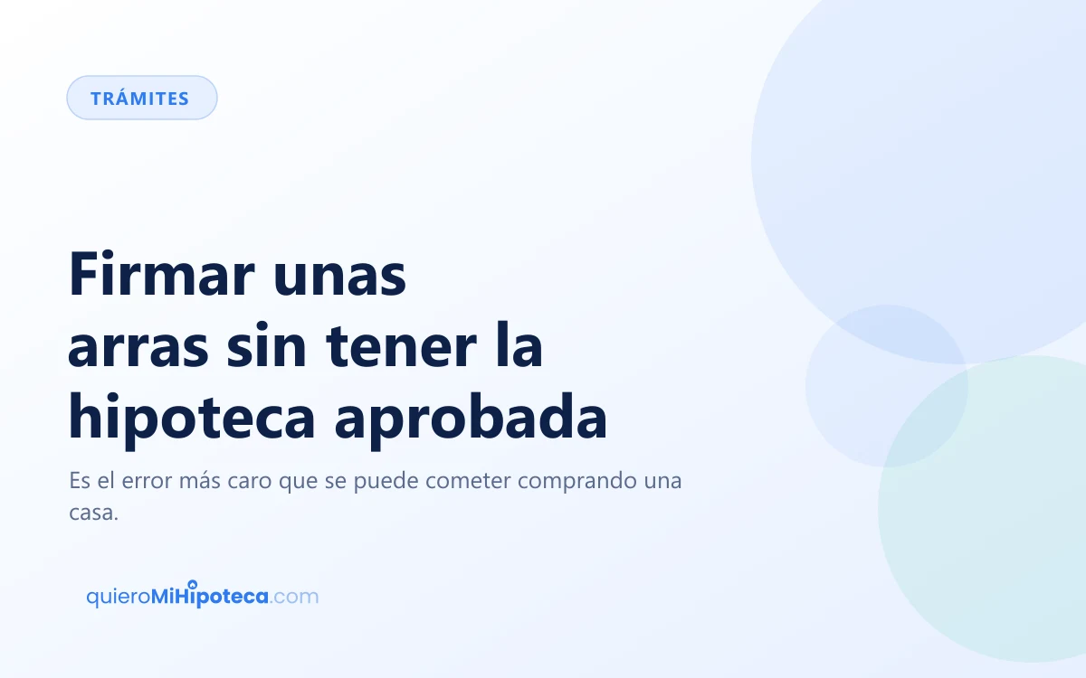 Contrato de arras y un bolígrafo sobre una mesa junto a unas llaves